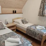 Goscinne Zych - *